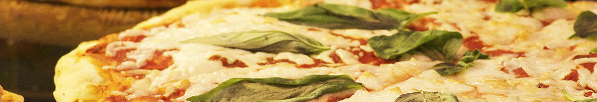 Eating Italian Pizza at Villa Barolo restaurant in Souderton, PA.